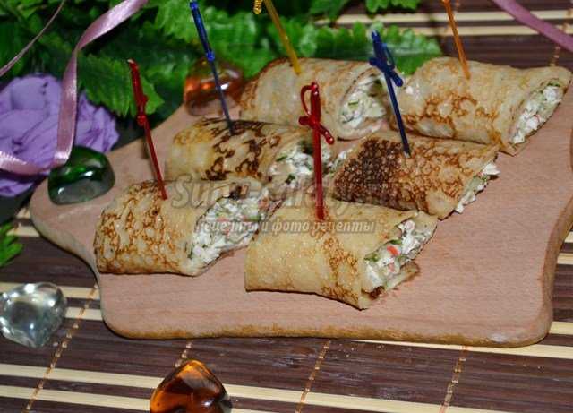 блины фаршированные крабовыми палочками и яйцом. Смотреть фото блины фаршированные крабовыми палочками и яйцом. Смотреть картинку блины фаршированные крабовыми палочками и яйцом. Картинка про блины фаршированные крабовыми палочками и яйцом. Фото блины фаршированные крабовыми палочками и яйцом